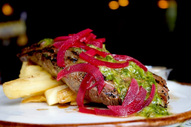 A chef-prepared steak dish from The Auction House