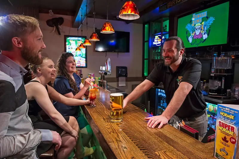 Bartender serving a draft