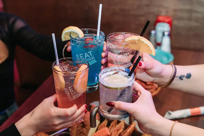 Cocktails raised in a toast