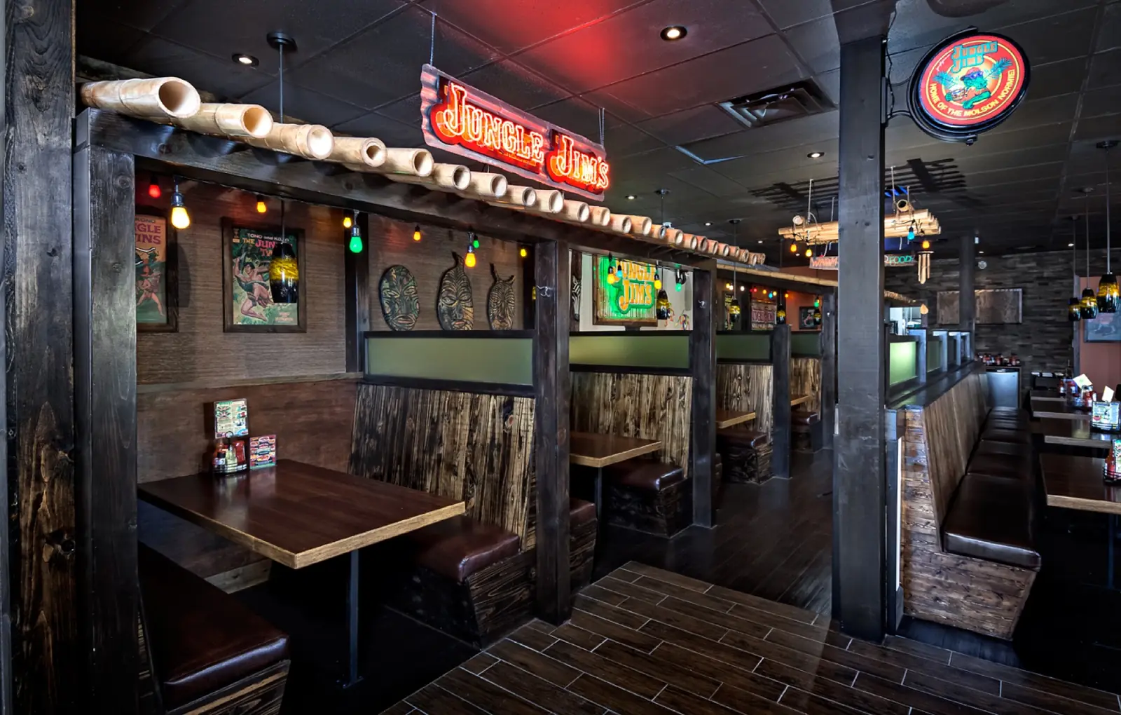 Jungle Jim's dining room with bamboo trim and red neon sign