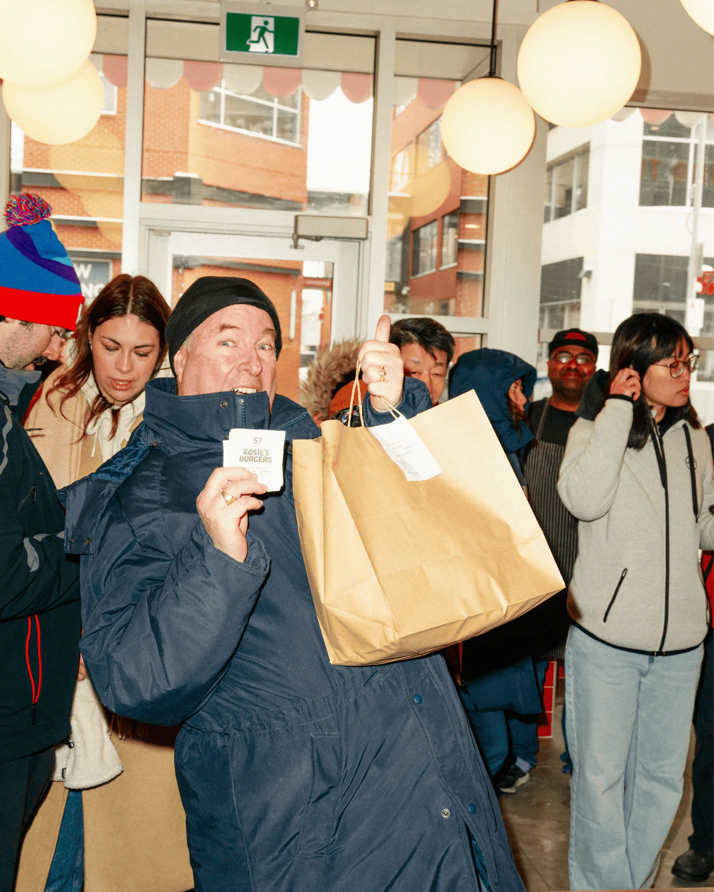 A line of customers outside a Rosie's shop