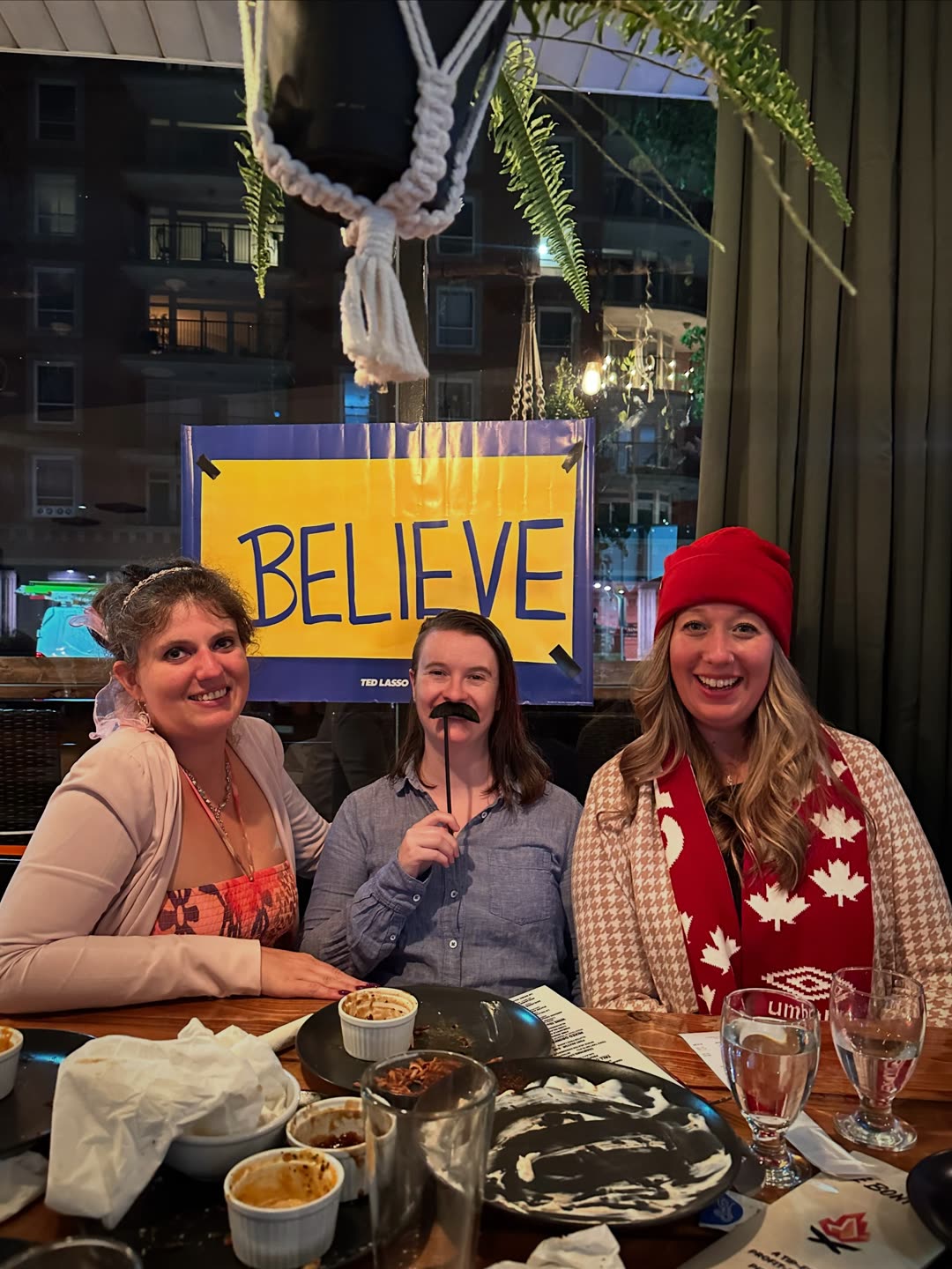 Keeley, Ted & Rebecca showed up to Ted Lasso trivia, BELIEVE poster and all.