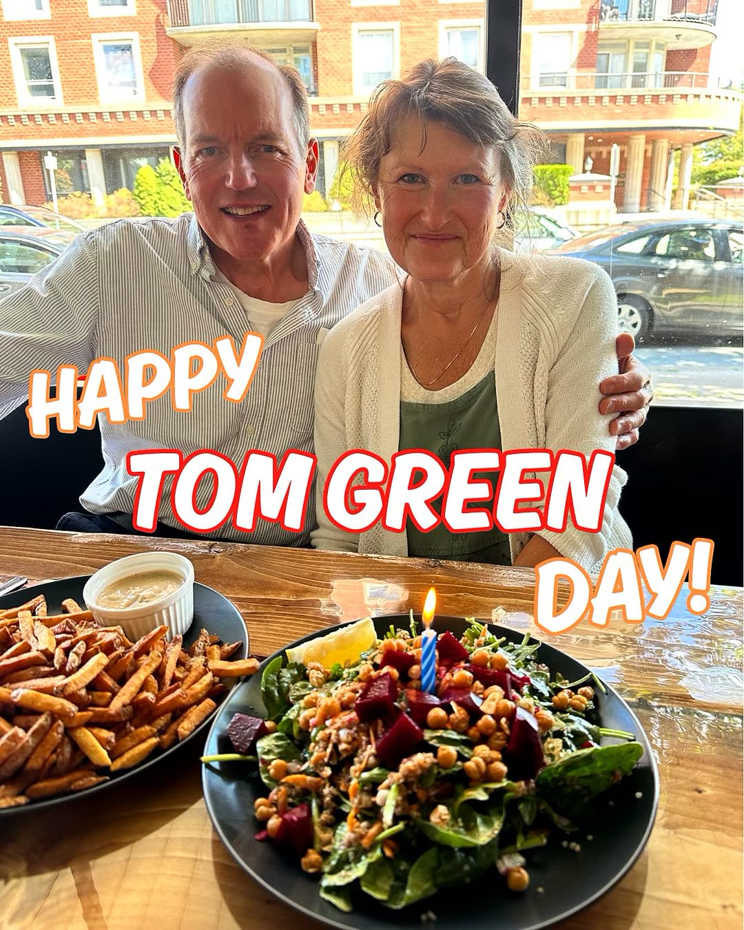 Kristyn's dad Tom Green and his wife at a Bonfire table on his birthday